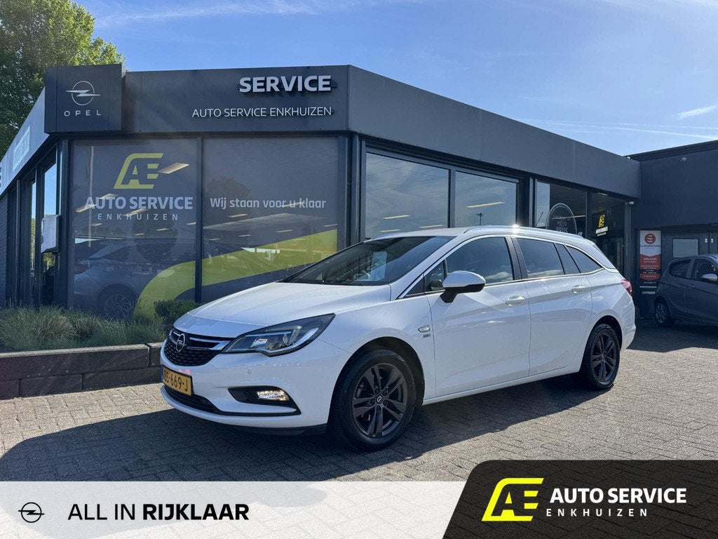 Opel Astra Sports Tourer 1.0 Turbo 120 Jaar Edition Rijklaar, 12 maanden, Stof, Gebruikt, Euro 6