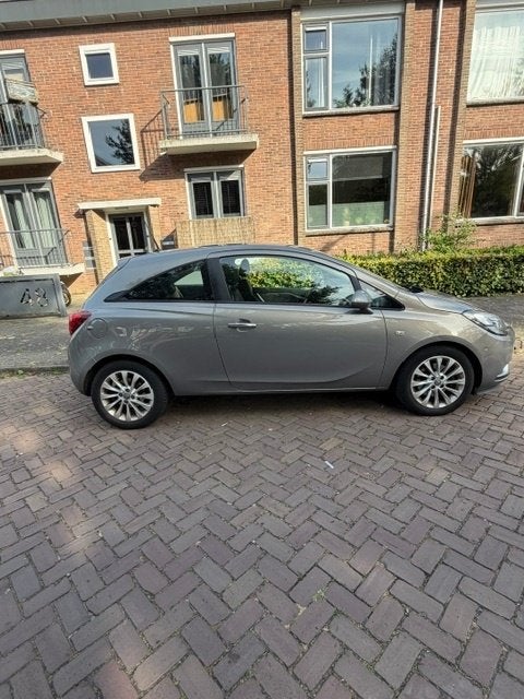 Opel Corsa 1.0T 66KW/90PK 3D 2015 Bruin, Auto's, Bruin, Origineel Nederlands, Particulier, 3 cilinders
