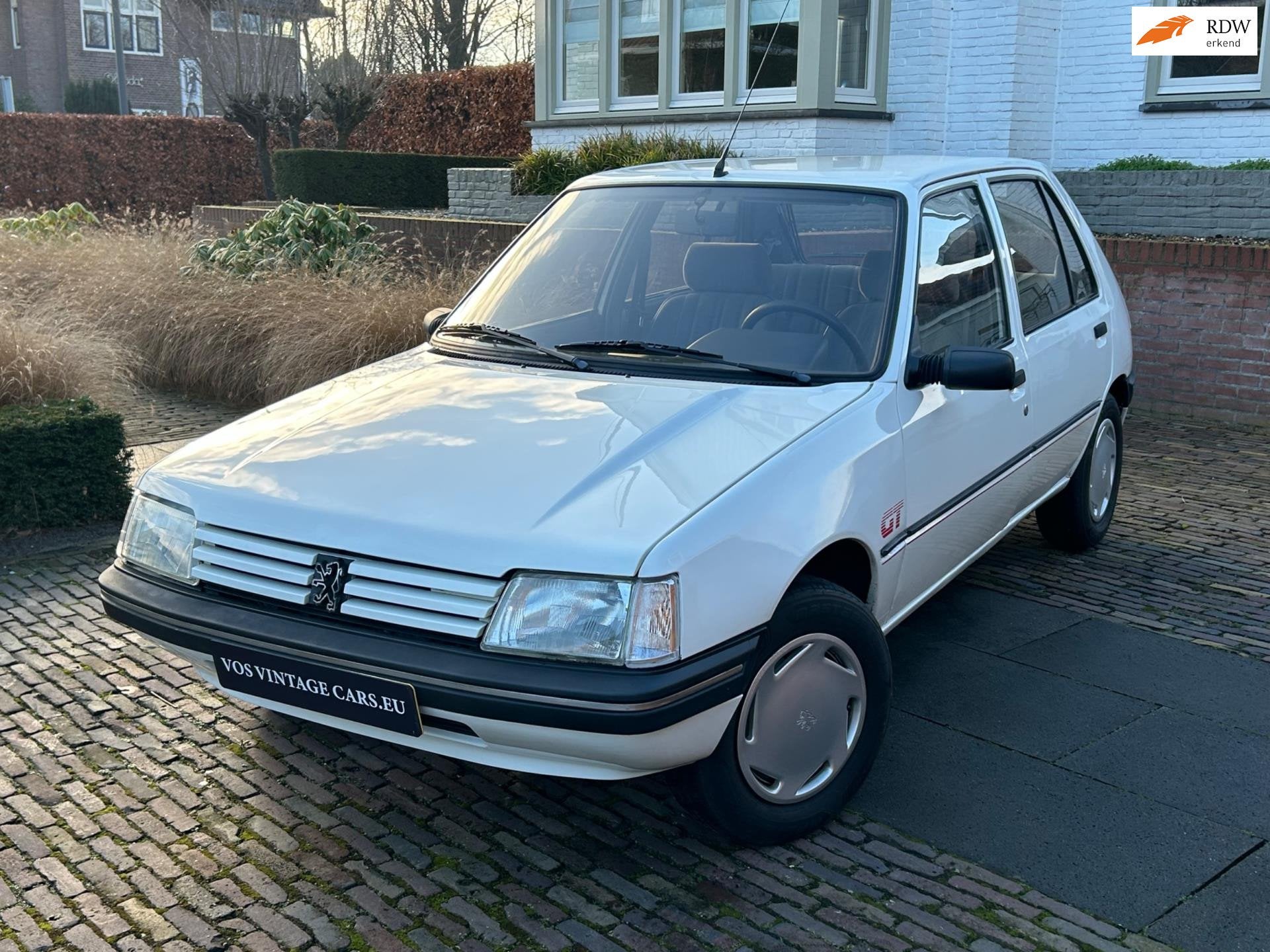 Peugeot 205 1.6 GT, Auto's, Gebruikt, 880 kg, Wit, Origineel Nederlands