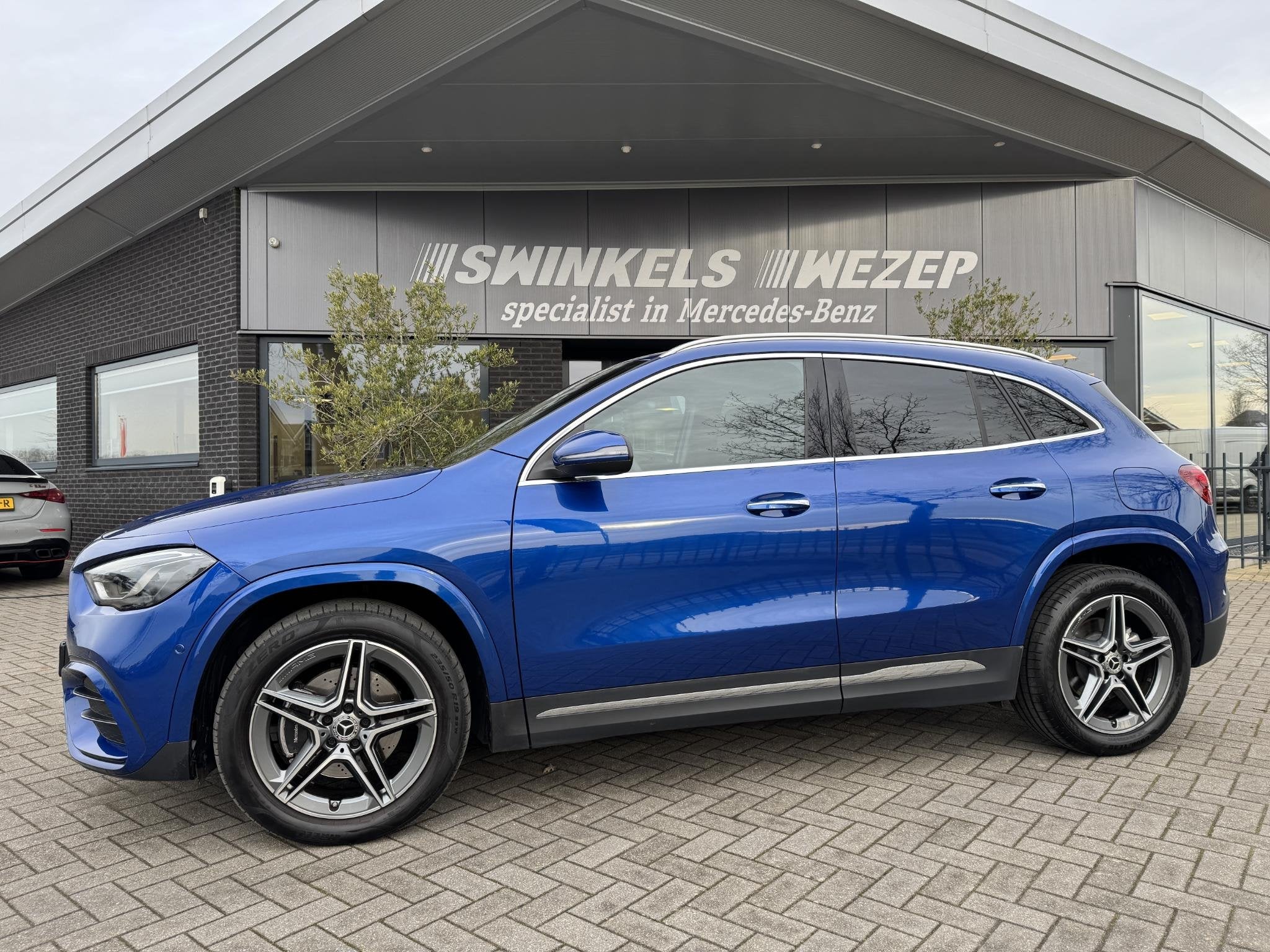 Mercedes-Benz GLA 250e AMG Line Achteruitrijcamera, Distroni, Stof, 16 kWh, Blauw, Bedrijf