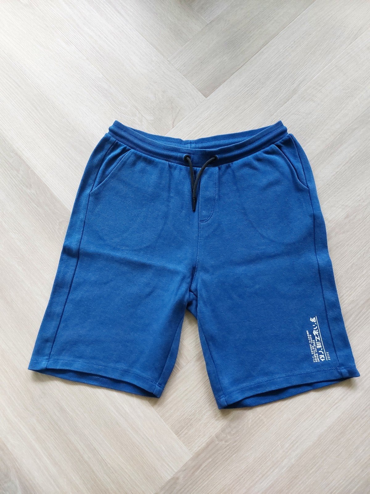 NETTE BLAUWE KORTE BROEK MAAT 176, Ophalen of Verzenden, Zo goed als nieuw, Jongen, Broek