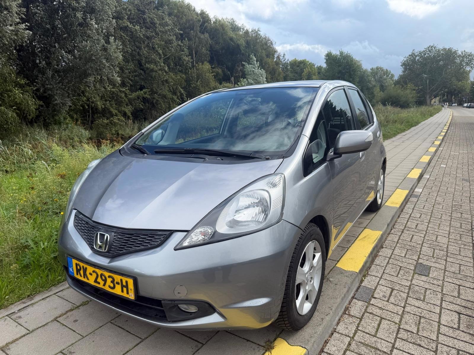 Honda Jazz 1.4 Comfort-Automaat, Auto's, Dealer onderhouden, 450 kg, Gebruikt, 4 cilinders