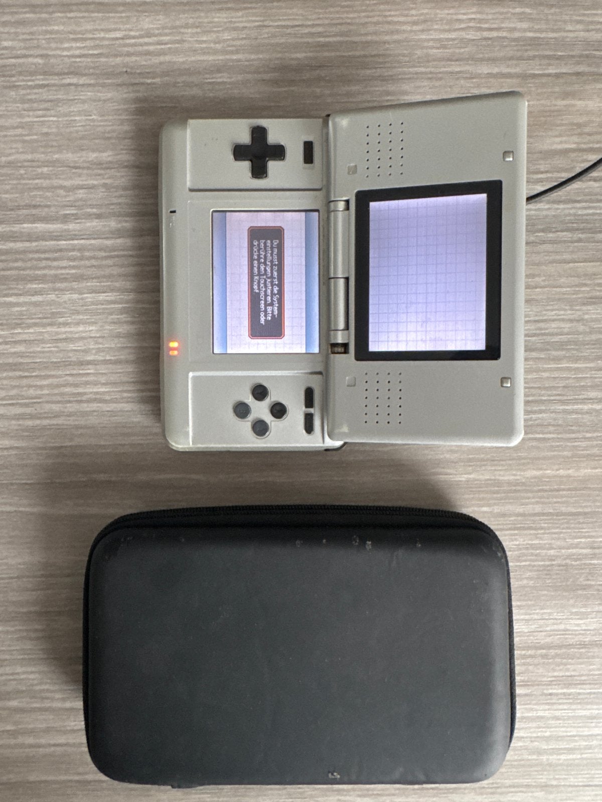 Nintendo DS Phat met 2 games en beschermhoes, Spelcomputers en Games, DS Original of Phat, Ophalen of Verzenden, Zilver, Gebruikt