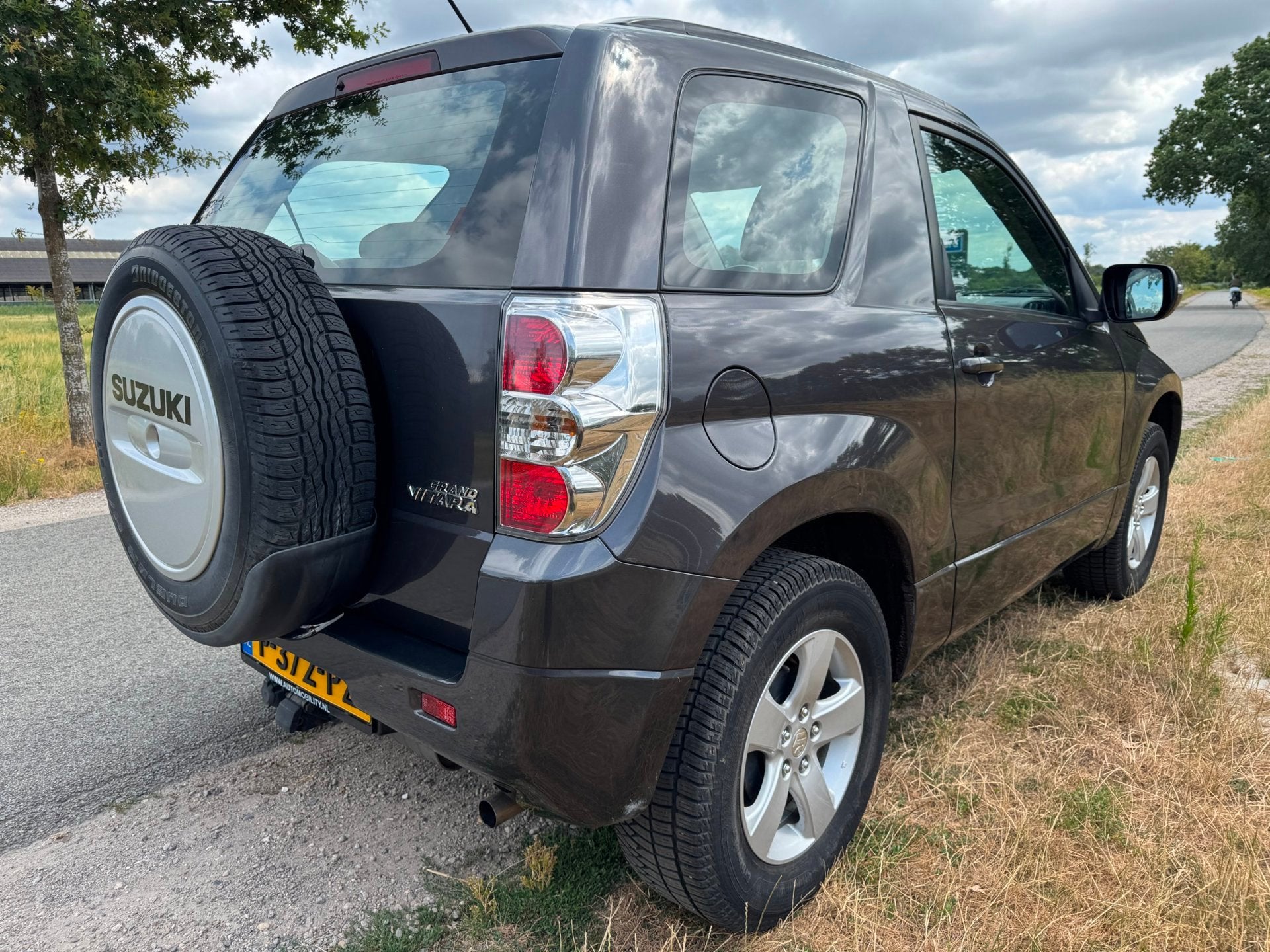 Suzuki Grand Vitara 1.6 Exclusive dealer onderhouden|climate, Auto's, Suzuki, Keurmerk '100% Onderhouden', Stof, Gebruikt, 4 cilinders