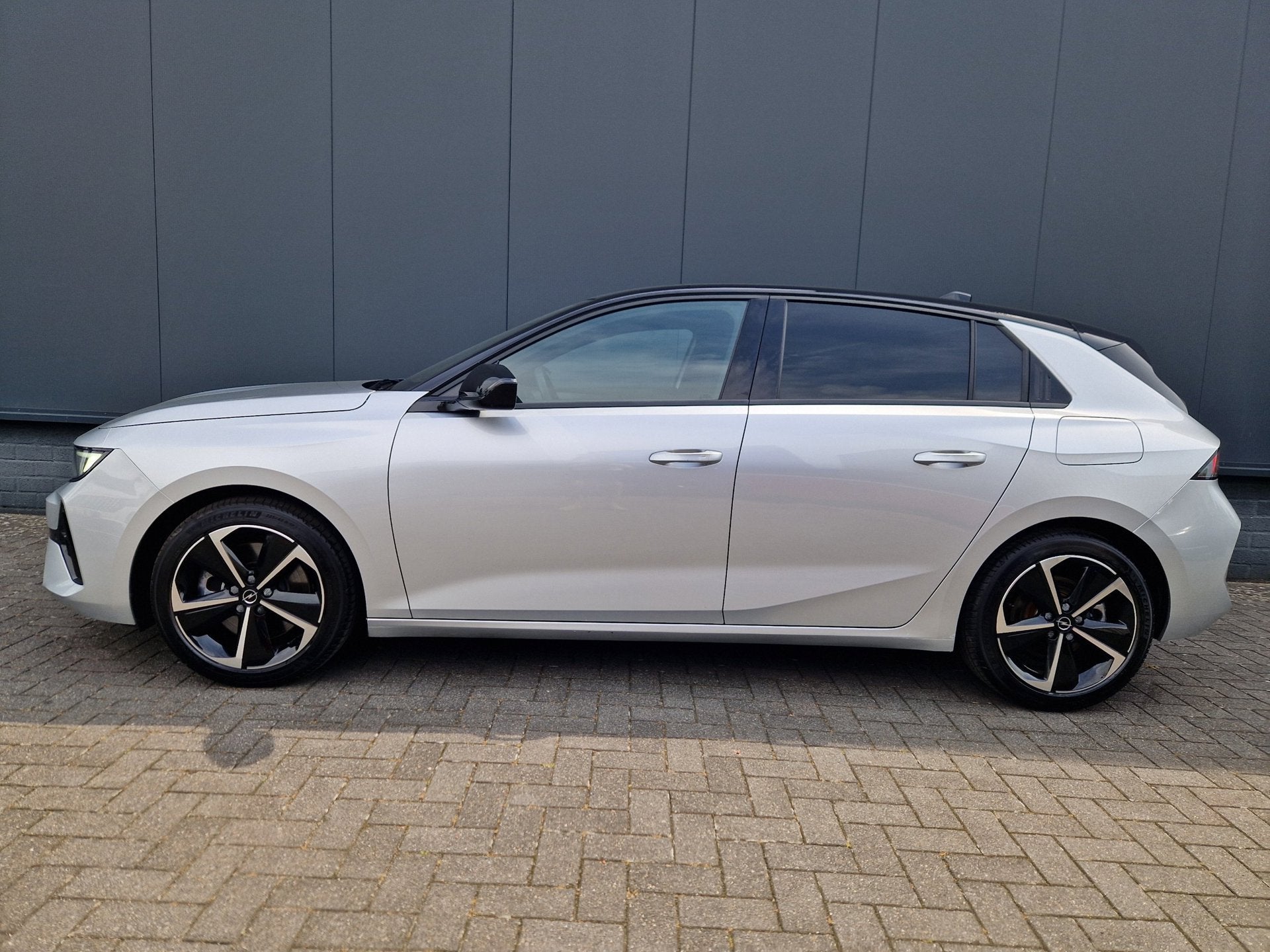 Opel Astra 1.6 Turbo PHEV GS 181pk SOH 99% /HUD /ACC /360cam, Auto's, 12 maanden, Gebruikt, 4 cilinders, Leder en Stof