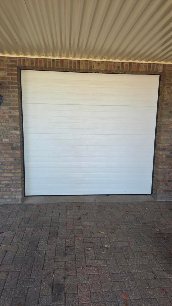 Electrische garagedeur, Doe-het-zelf en Verbouw, Ophalen