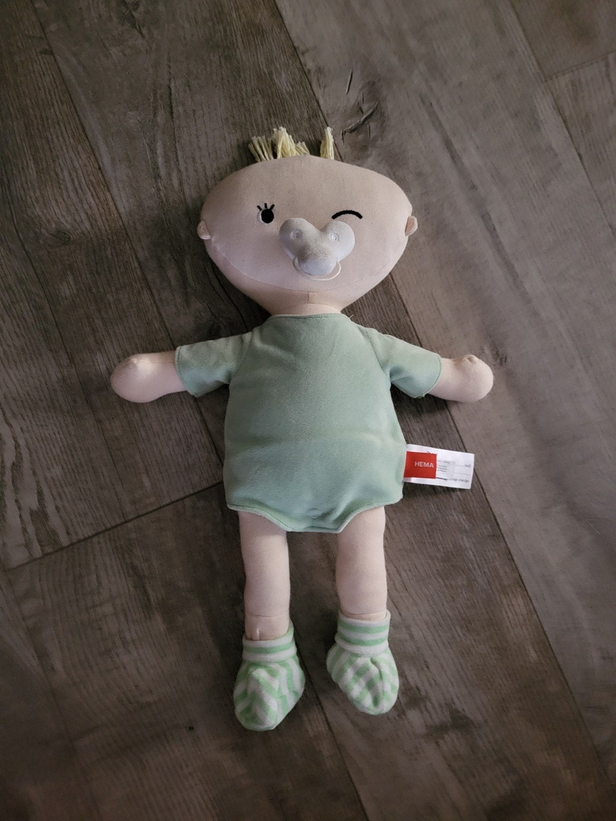 Hema babypop met speen en groen rompertje, Ophalen of Verzenden