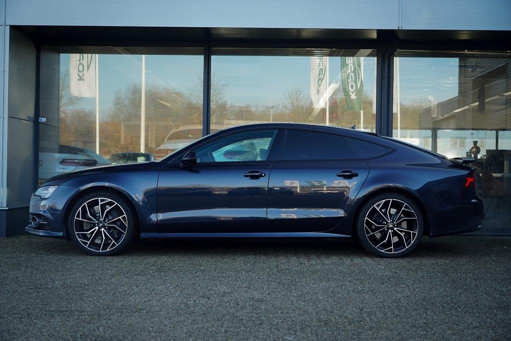 Audi A7 Sportback 4.0 TFSI S7 quattro Pro Line Plus / Luchtv, Auto's, Audi, Gebruikt, Regensensor, 4 stoelen, Zwart