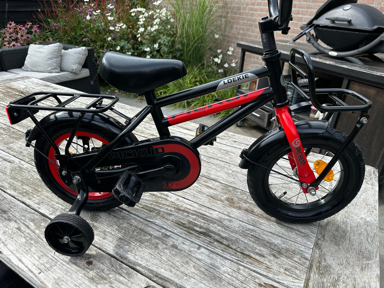 Loekie Pickup kinderfiets 12 inch met zijwieltjes, Fietsen en Brommers, Terugtraprem, Zijwieltjes, Gebruikt, Ophalen of Verzenden