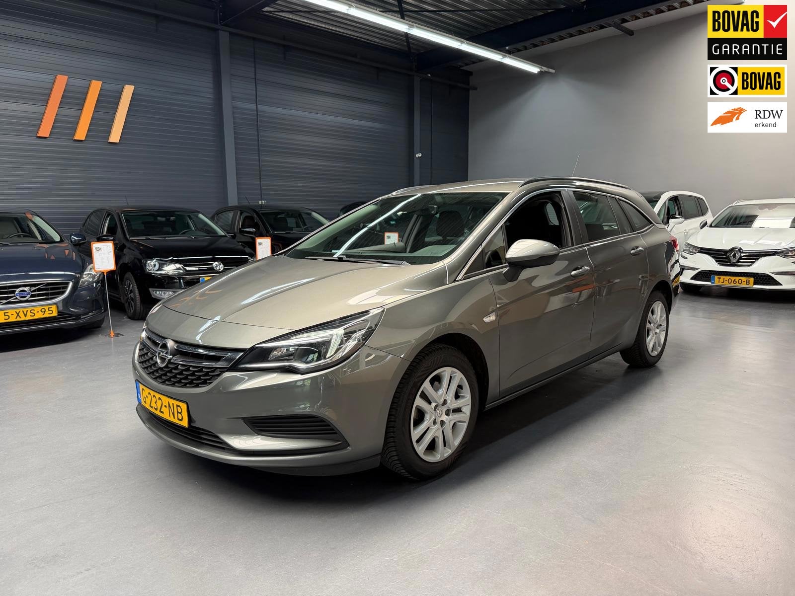 Opel Astra Sports Tourer 1.4 Turbo Business+ DEALER ONDERHOU, Auto's, Opel, Voorwielaandrijving, Dealer onderhouden, Gebruikt