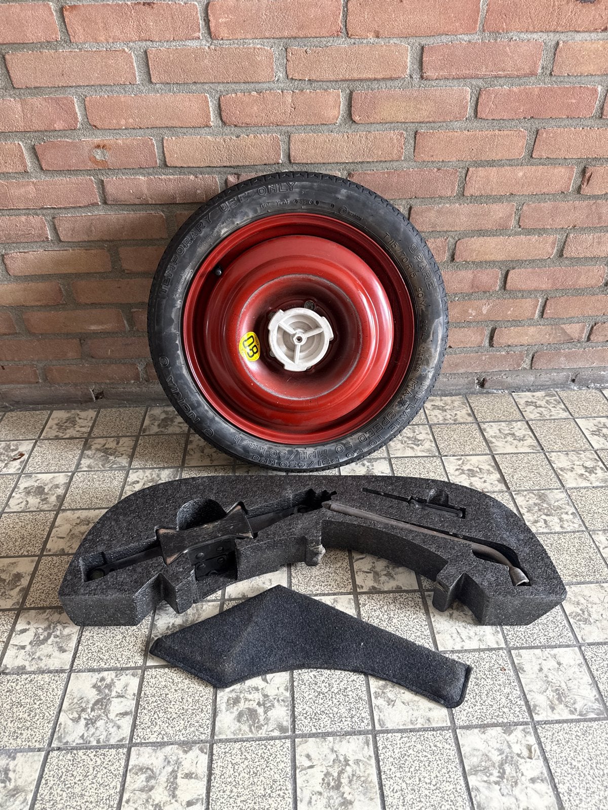 Compact reservewiel en gereedschap van een saab 9-3 cabrio, Ophalen of Verzenden