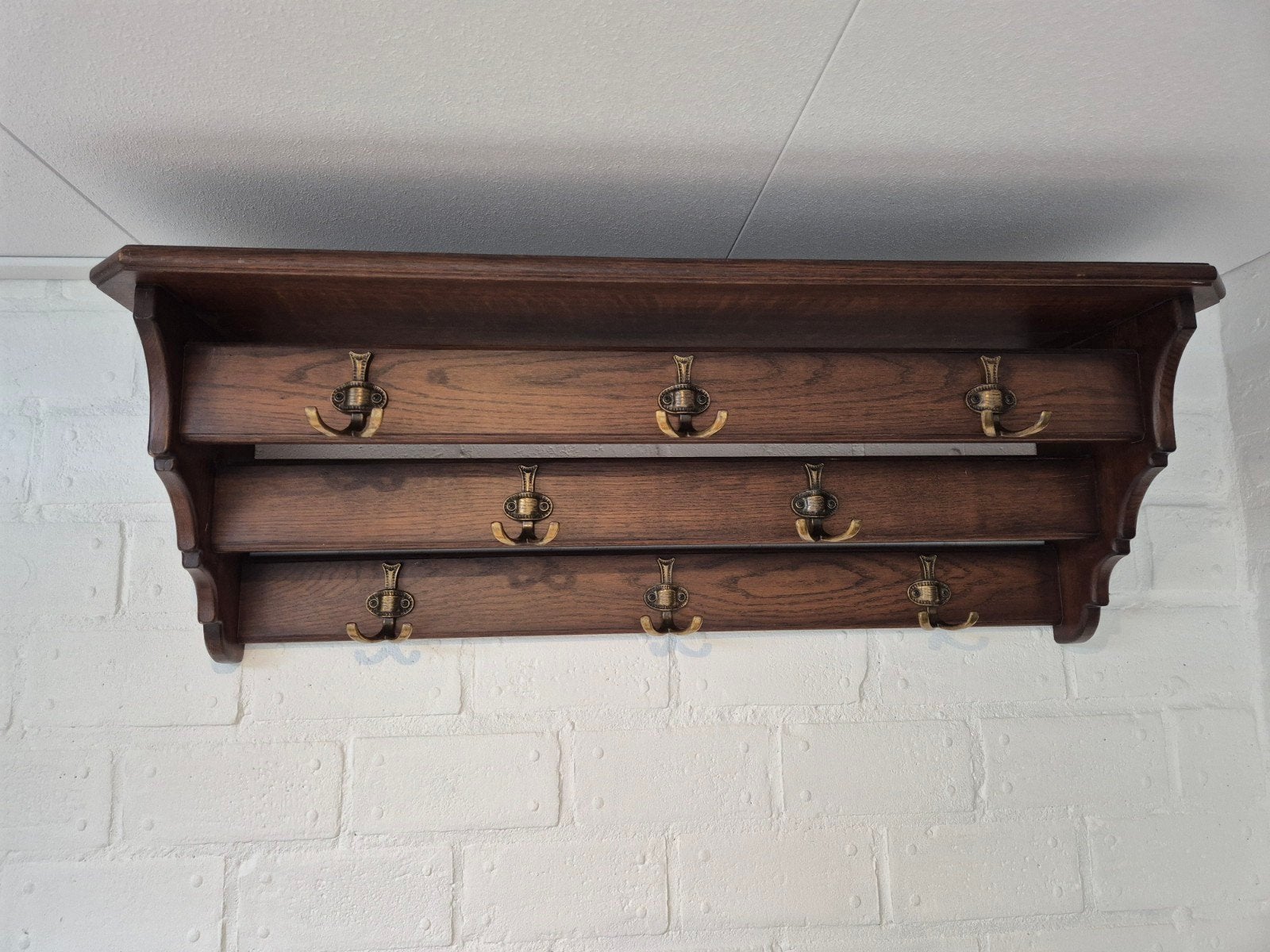 Vintage houten wandkapstok met 8 bronzen haken, Ophalen
