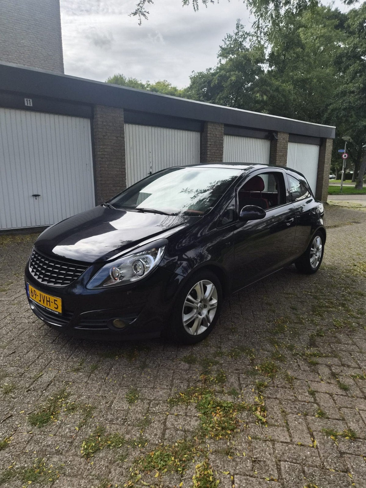 Opel Corsa 1.2 16V 3D WR 2009 Zwart, Voorwielaandrijving, 450 kg, 40 €/maand, 1229 cc