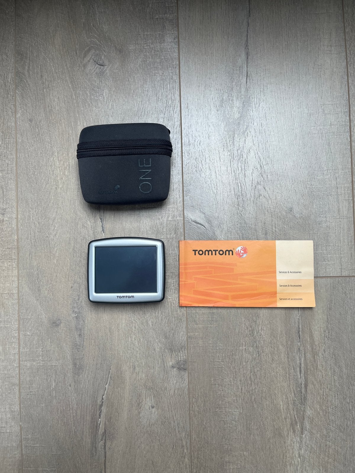 TomTom ONE Navigatiesysteem met hoesje (zonder lader), Auto diversen, Ophalen of Verzenden, Gebruikt