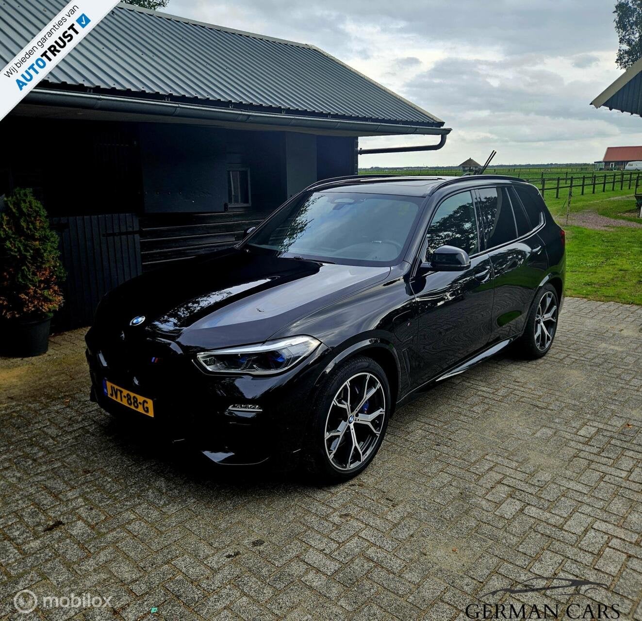 BMW X5 xDrive45E High Executive Hybride 394PK | SKY Lounge, Auto's, Automaat, Lederen bekleding, Zwart, Leder
