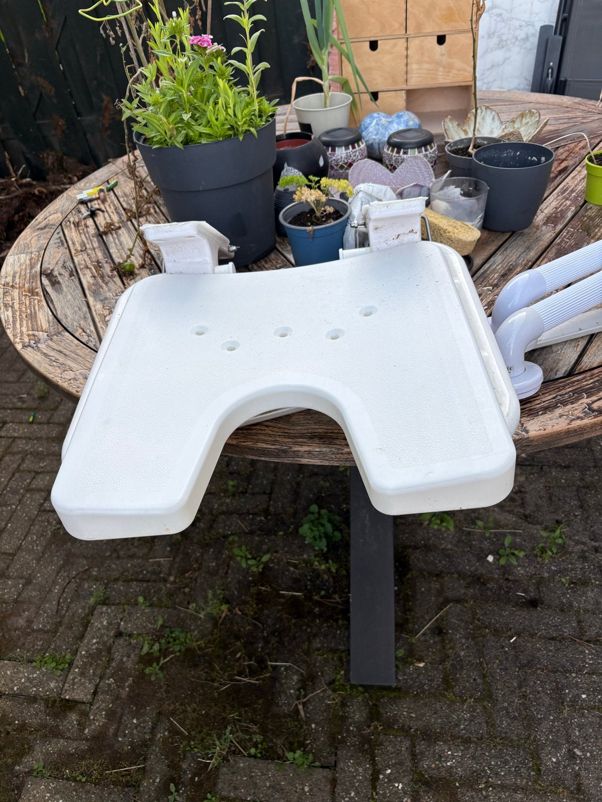 Douch stoeltje, Ophalen, Gebruikt