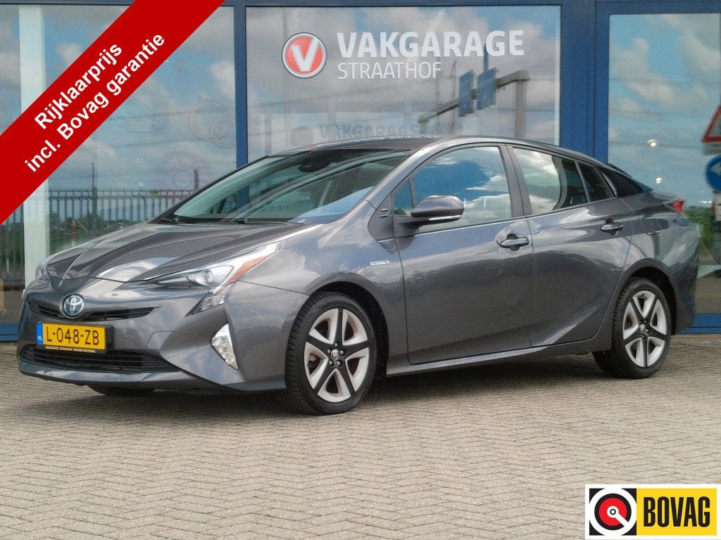 Toyota Prius 1.8 Dynamic, Trekhaak / Navigatie / Camera / St, Stof, Met garantie (alle), Stoelverwarming, 122 pk