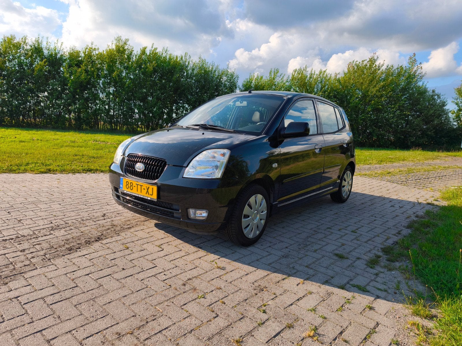 Kia Picanto 1.1 E X 48KW 2006 Zwart, luxe uitvoering., Auto's, Kia, Stof, 4 cilinders, Zwart, Overige kleuren