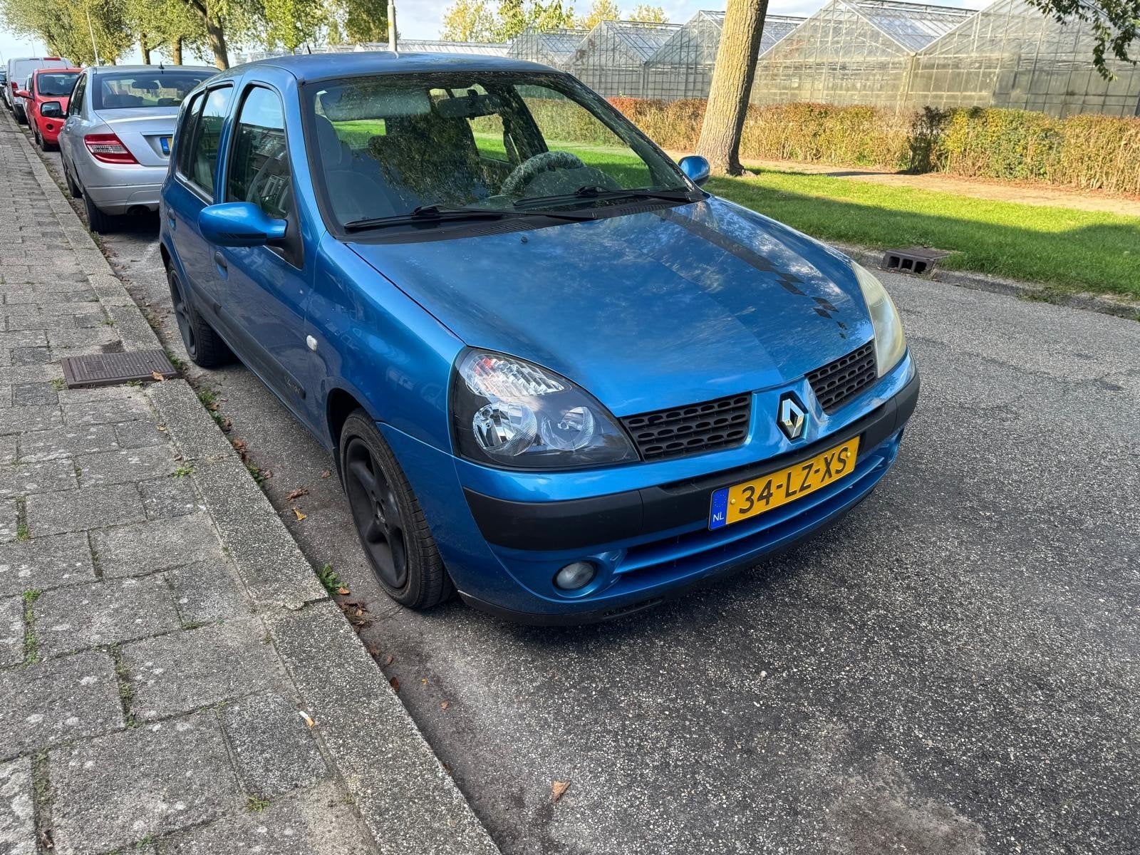 Renault Clio 1.4 16V Expr 5DR AUT 2005 2003 Blauw, Auto's, 1005 kg, 40 €/maand, 4 cilinders, Blauw