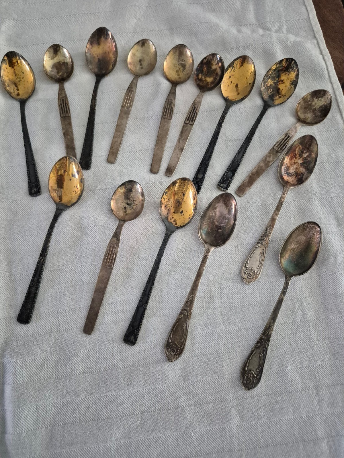 Antiek verzilverde theelepels, Ophalen