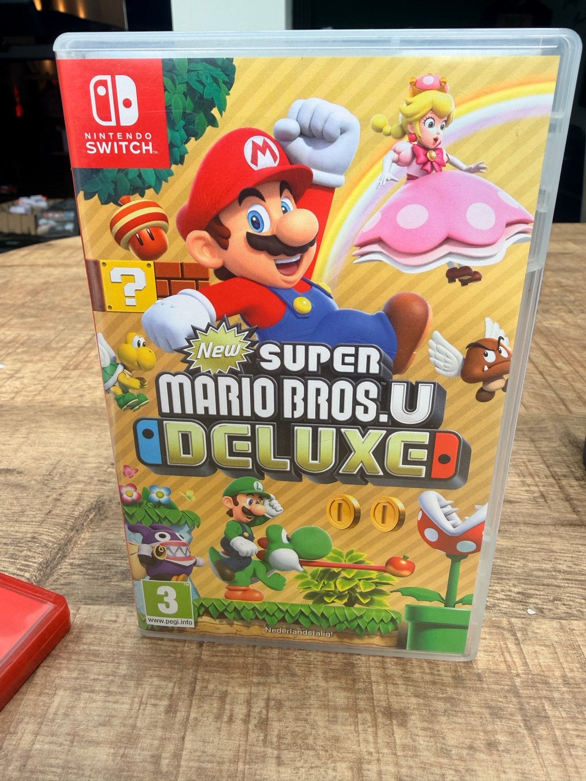 New Super Mario Bros. U Deluxe - Nintendo Switch, Spelcomputers en Games, Games | Nintendo Switch, Zo goed als nieuw, Platform