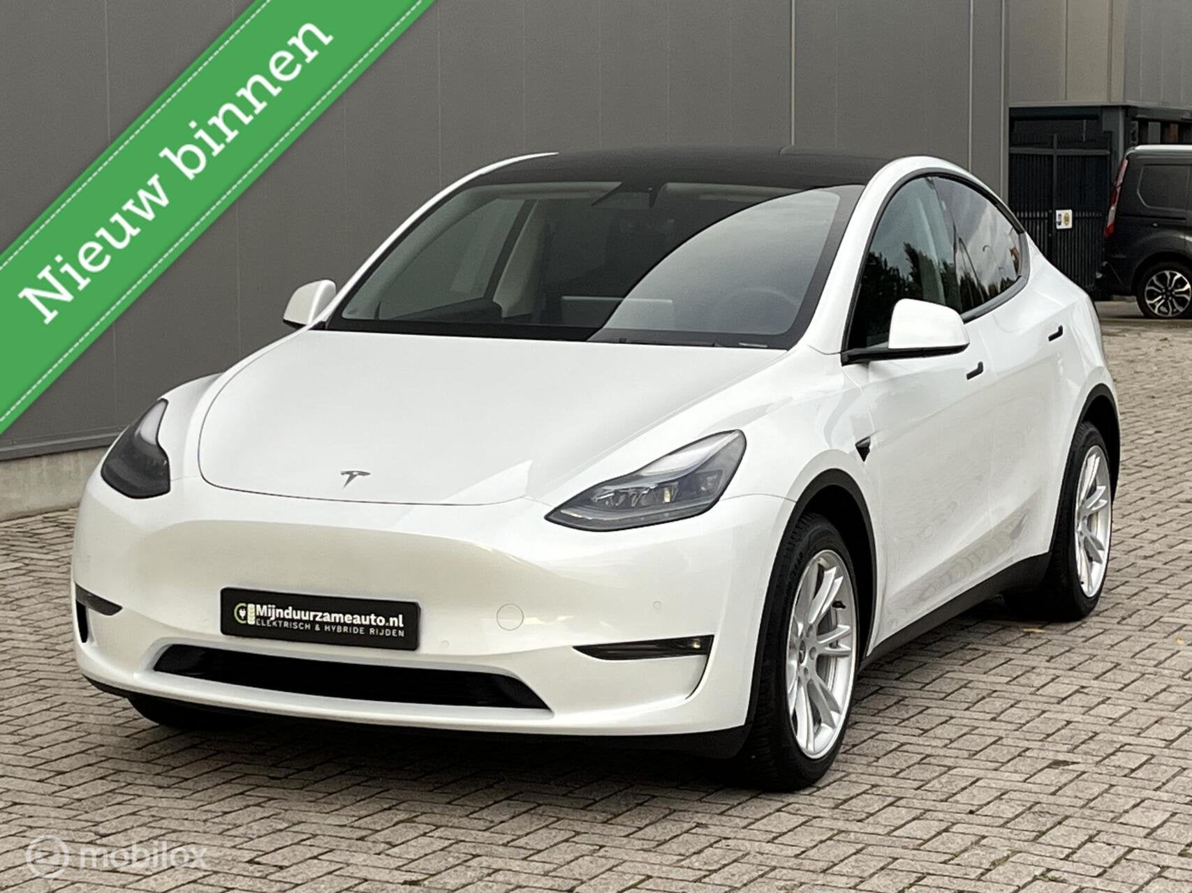 Foto 3 van Tesla Model Y Long Range AWD 75 kWh, FSD , Trekhaak Netjes