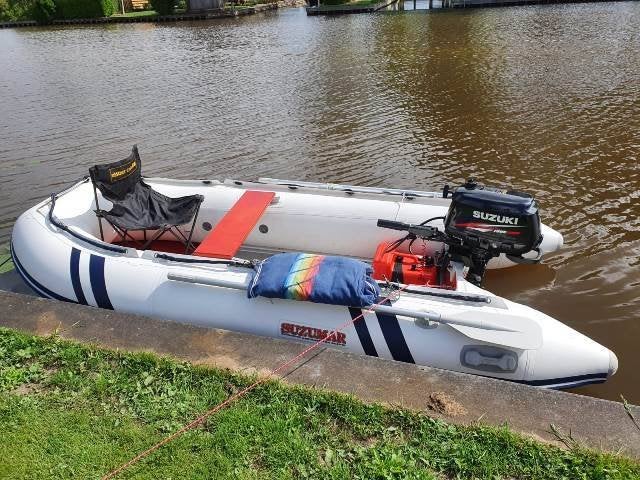 Te koop Suzumar rubberboot met buitenboord motor Suzuki 6 PK, Ophalen, Aluminium, 6 pk, Zo goed als nieuw