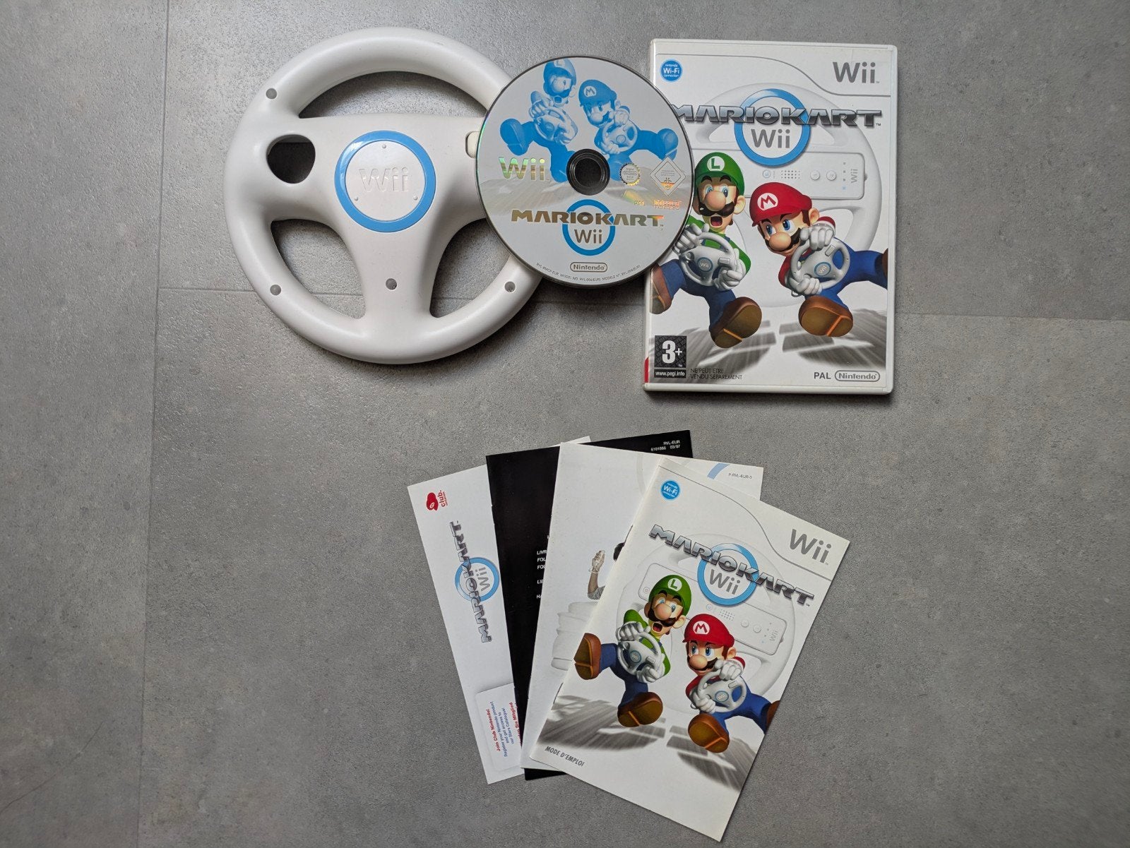 Mario Kart Wii met stuurtje, Racen en Vliegen, Ophalen of Verzenden, Zo goed als nieuw, 3 spelers of meer