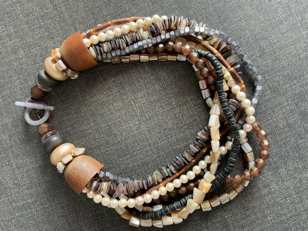 Langani unieke  handgemaakte ketting, Sieraden, Tassen en Uiterlijk, Ophalen of Verzenden, Zo goed als nieuw, Bruin, Overige materialen