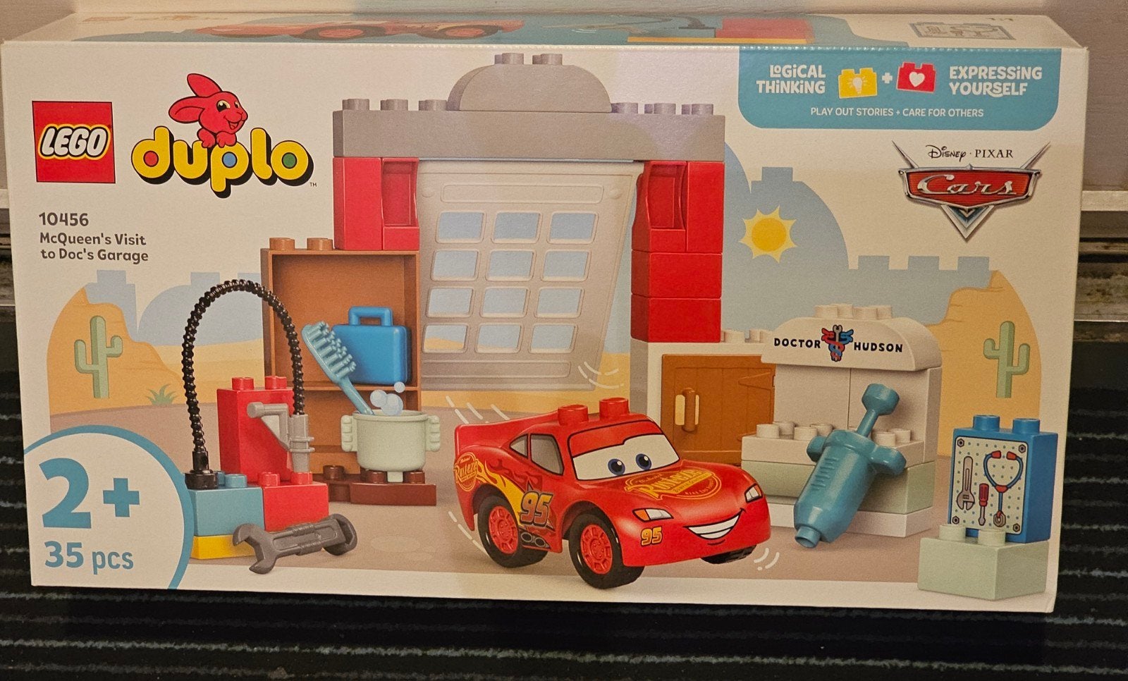 LEGO Duplo Cars 10456 McQueen's bezoek aan Doc's Garage, Overige thema's, Nieuw, Ophalen of Verzenden, Compleet