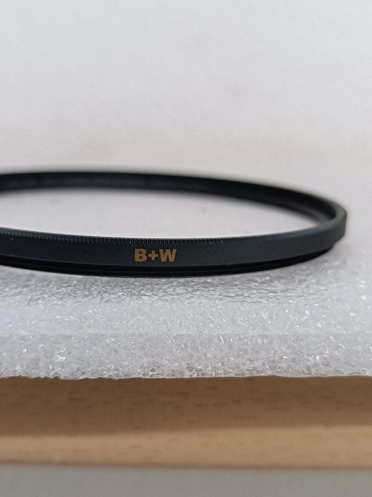 2 UV filters 76mm  van B+W en  Hoya, Multi-coating, B+W, UV-filter, Ophalen of Verzenden