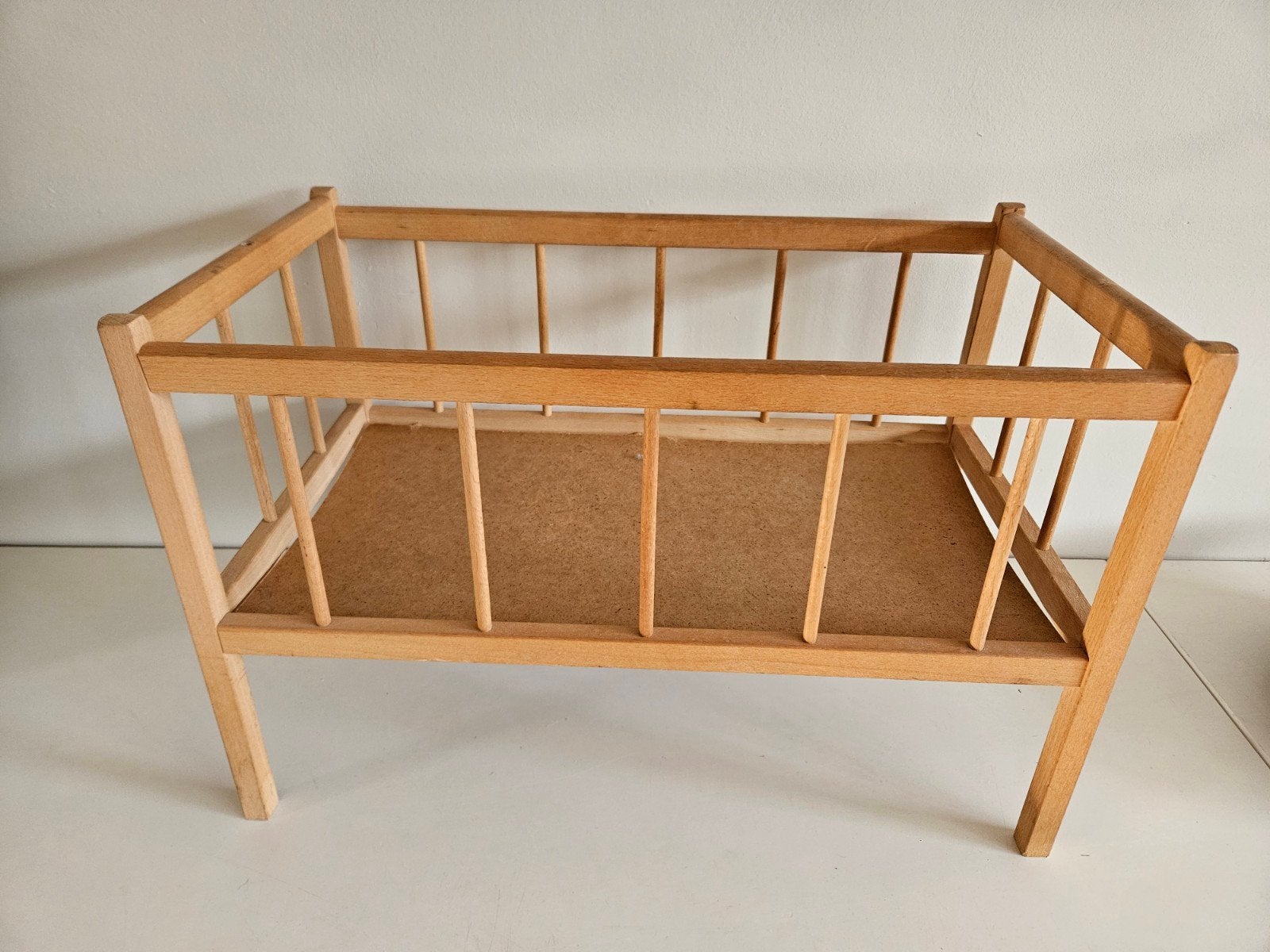 Houten poppenbedje, Ophalen, Gebruikt