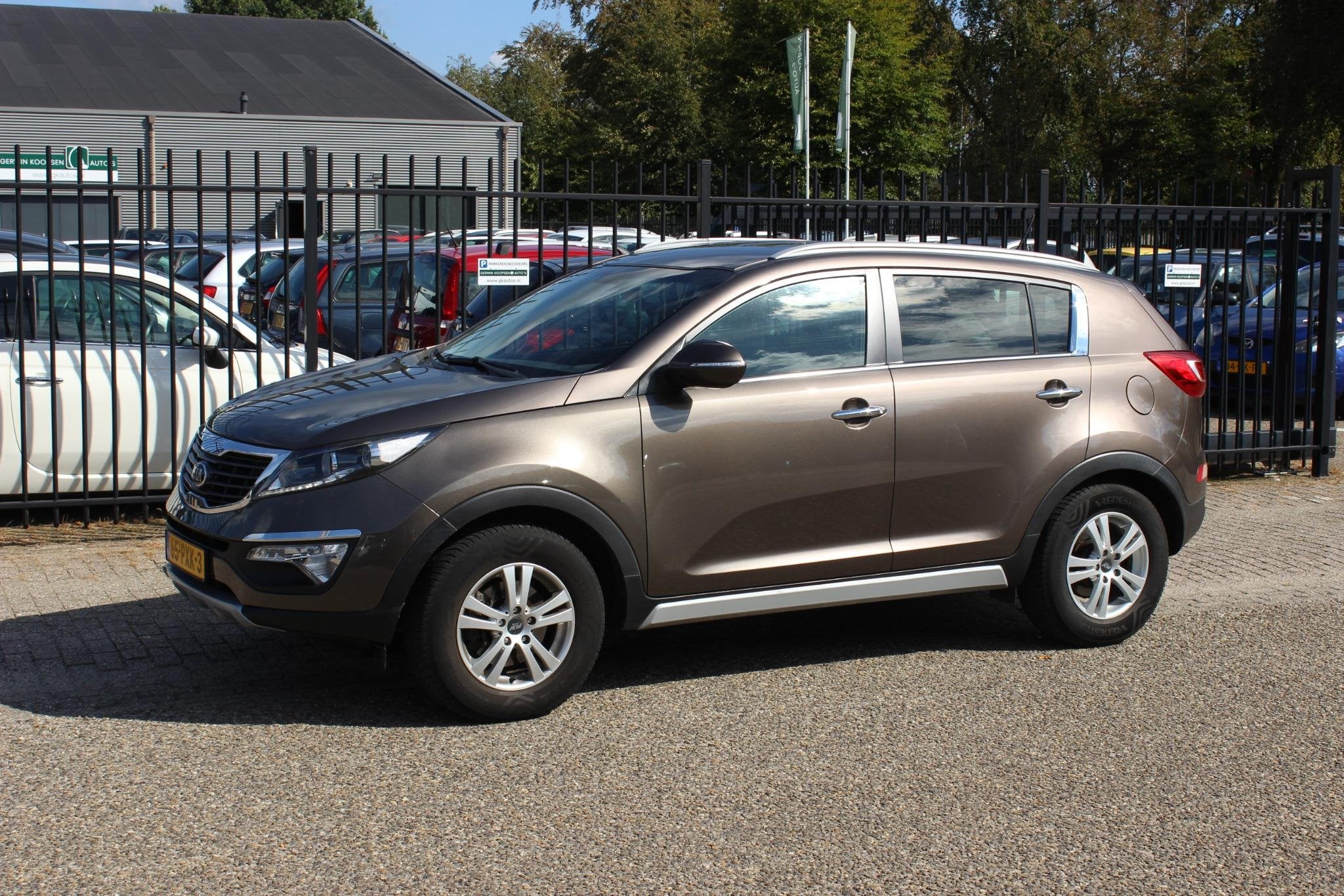 Kia Sportage 2.0 X-ecutive 4wd Plus Pack, Auto's, 13 km/l, Gebruikt, 4 cilinders, Bruin