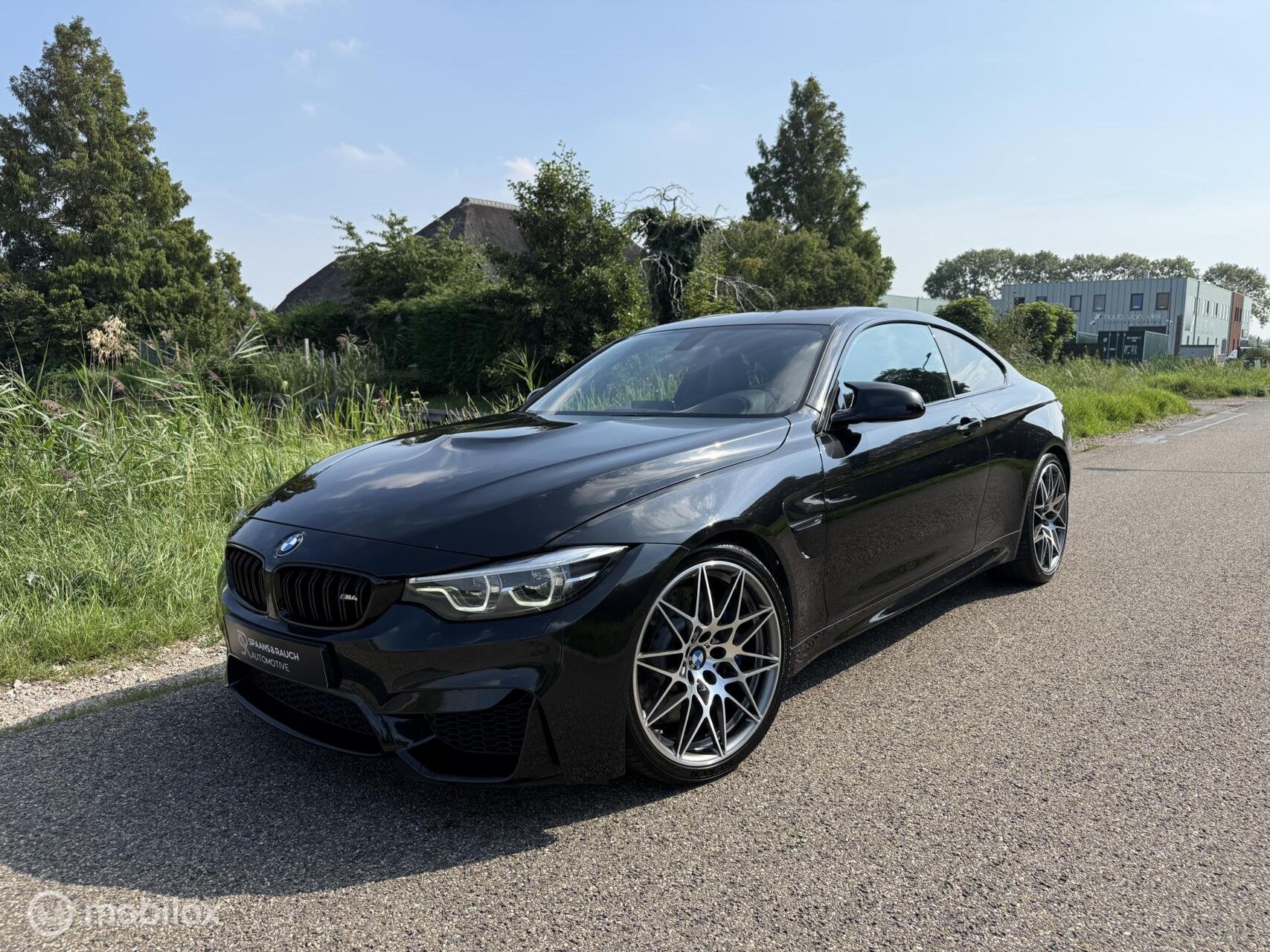 BMW M4 Competition Coupé / Carbon / HUD / Harman / Leder, Auto's, Automaat, Dealer onderhouden, Achterwielaandrijving, Zwart