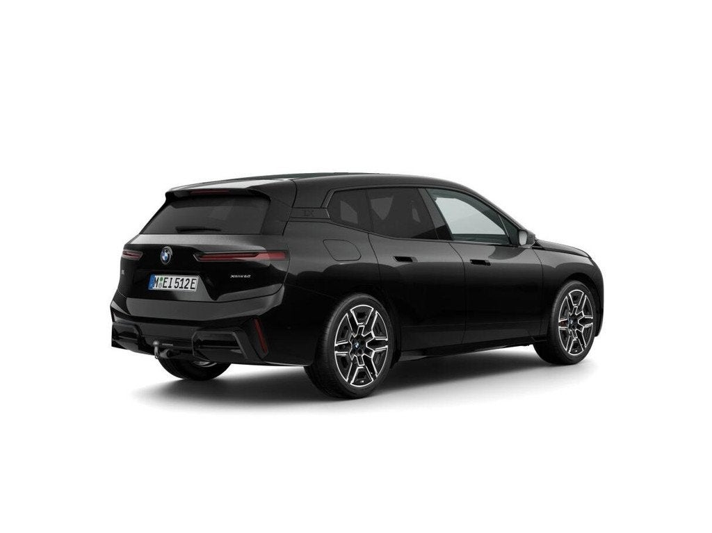 BMW iX xDrive60 | M Sportpakket Pro | Comfort Pack | Innovat, Auto's, BMW, Automaat, Stof, Zwart, Zwart