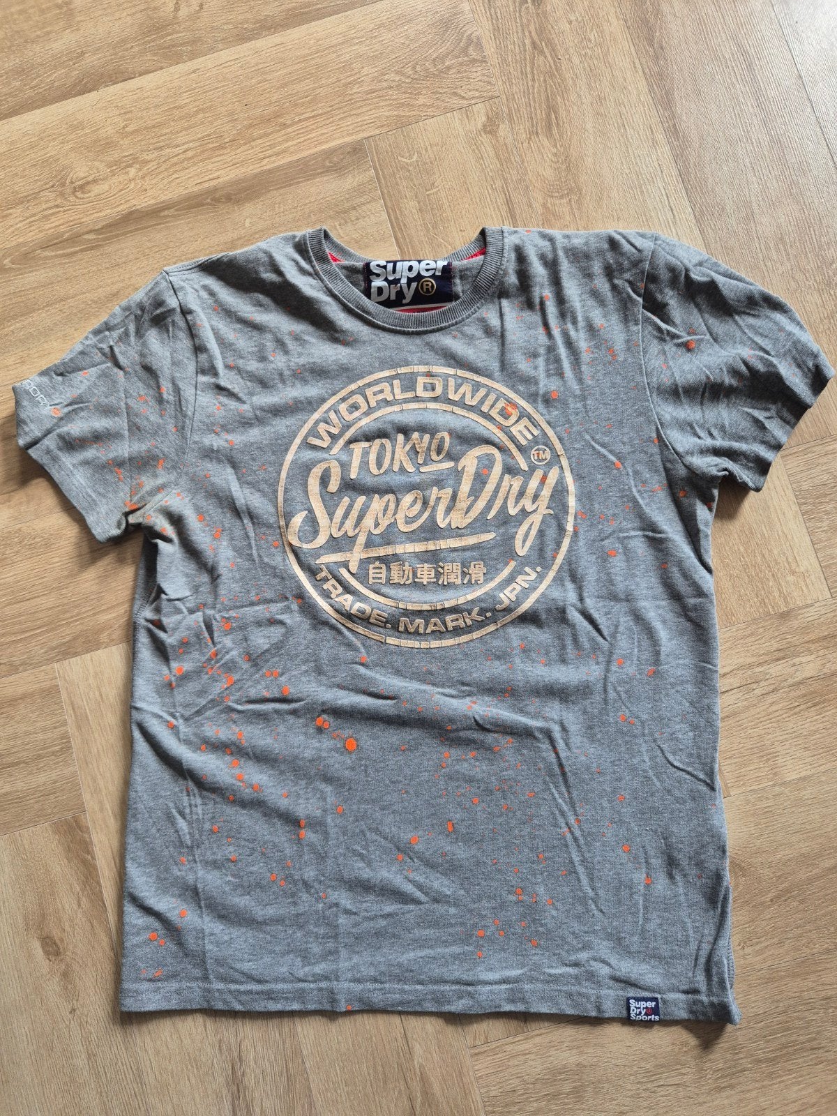 Superdry T-shirt XL - Grijs met oranje spetters, Maat 56/58 (XL), Ophalen of Verzenden, Grijs, Gedragen