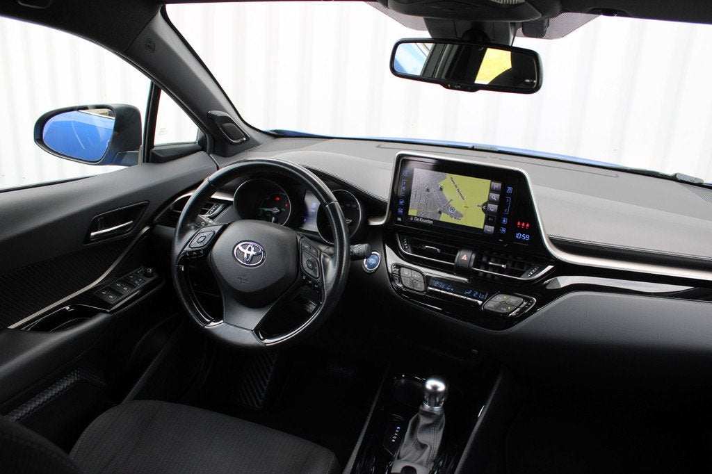 Toyota C-HR 1.8 Hybrid Style Ultimate | Incl. 12 maanden gar, Auto's, 12 maanden, Stof, 4 cilinders, Blauw