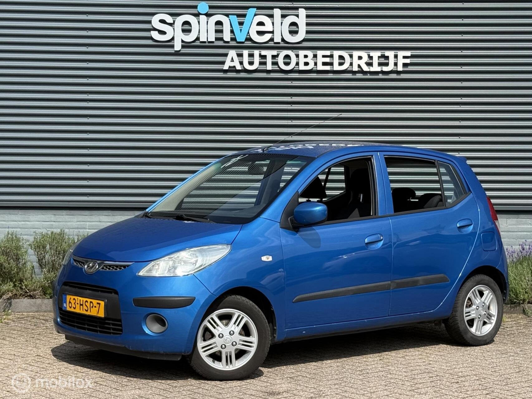 Hyundai i10 1.25i i-Catcher - Airco - Elektrische ramen - Ce, Auto's, Voorwielaandrijving, 450 kg, Gebruikt, 31 €/maand