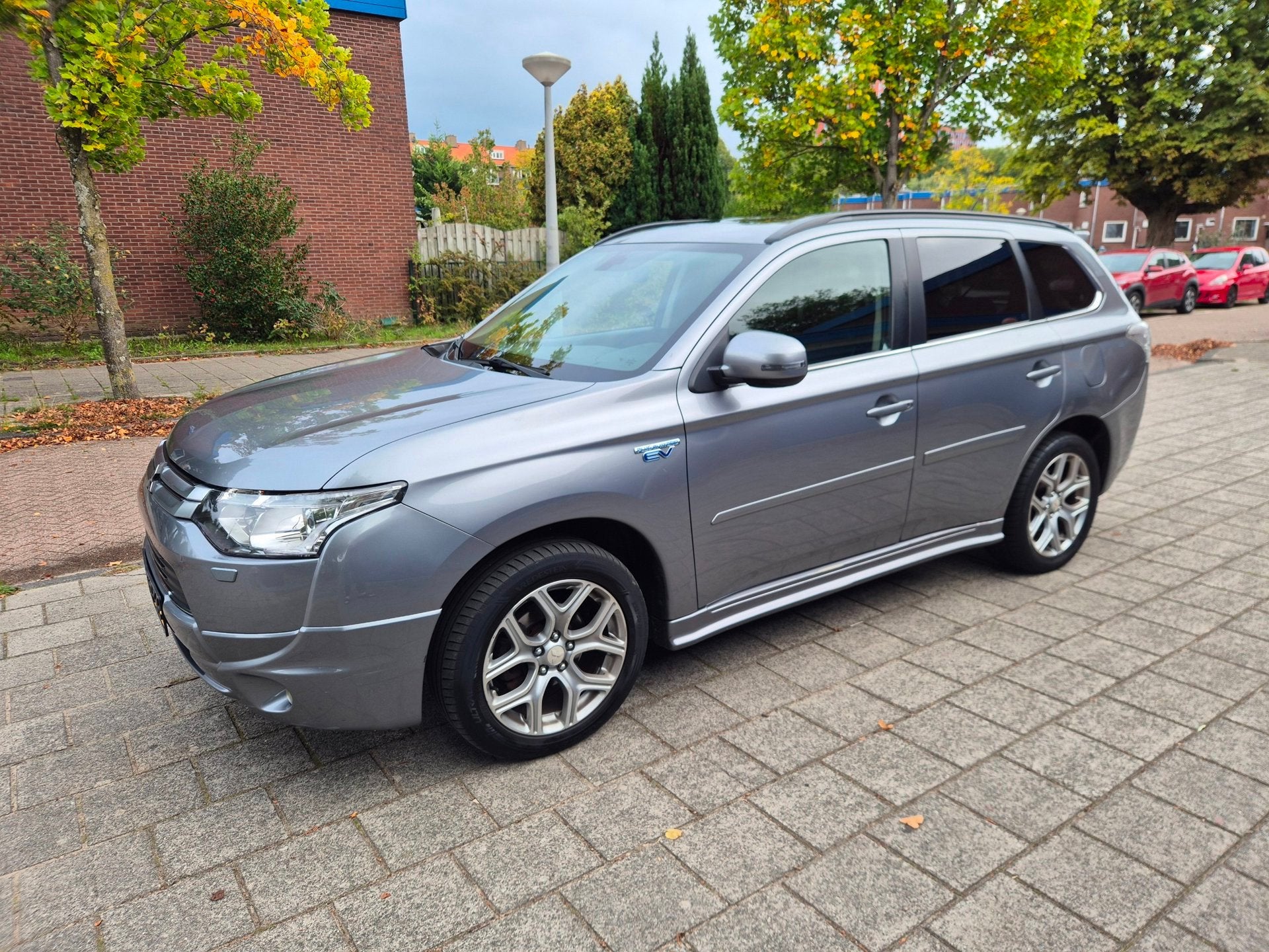 Mitsubishi Outlander 2.0 PHEV instyle+ Panorama Leder Cruise, Auto's, Zwart, 4 cilinders, Vierwielaandrijving, Hybride Elektrisch/Benzine