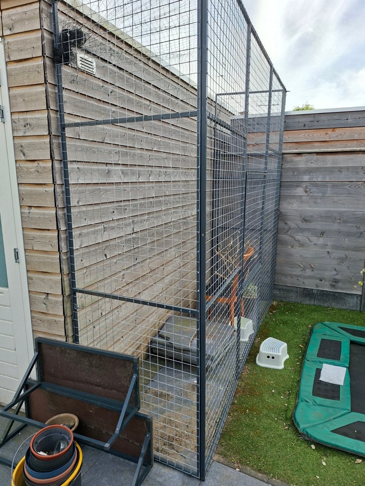 Kattenren aluminium balkon, Ophalen