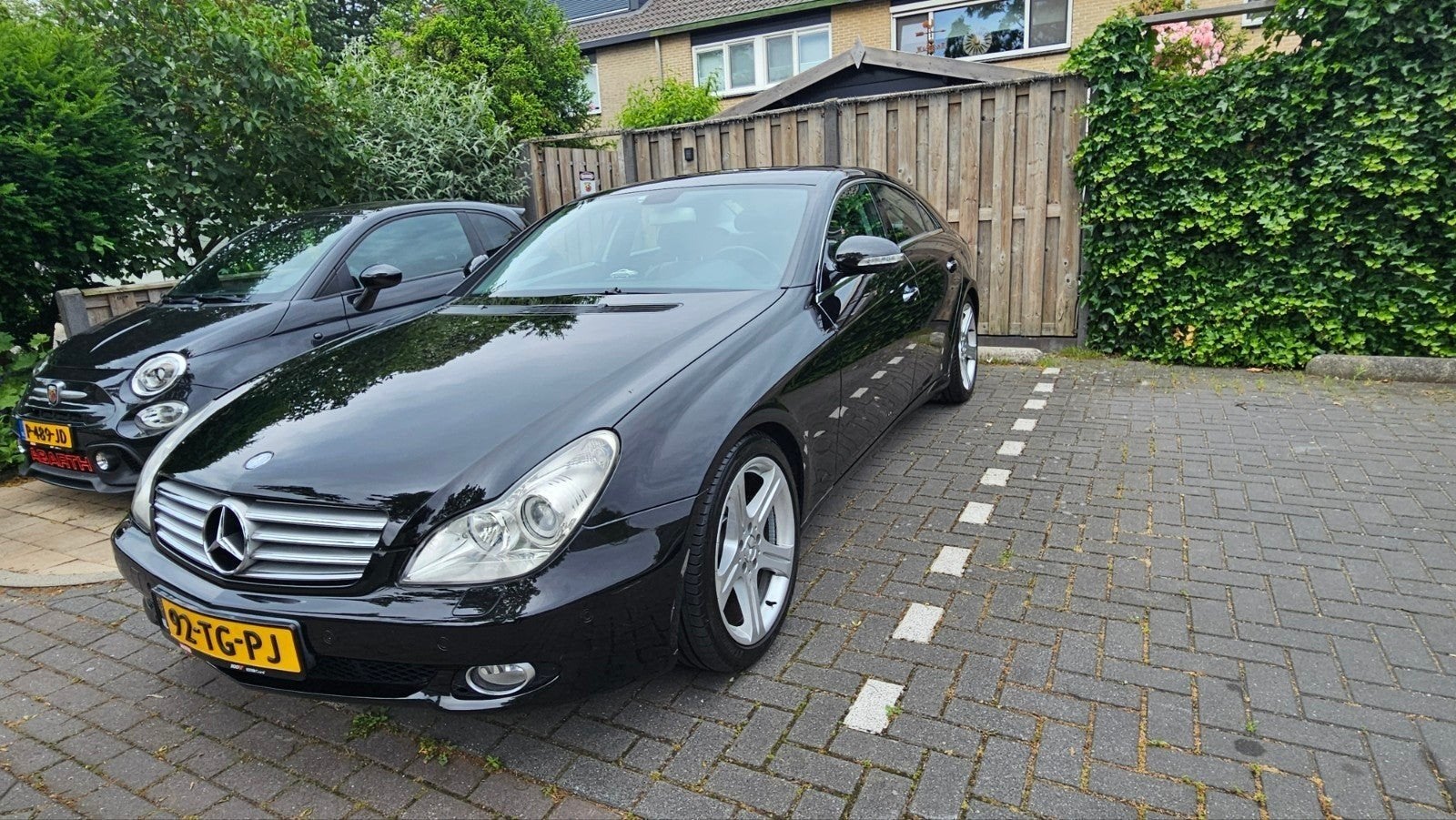 Mercedes-Benz CLS 5.0 Cls500 AUT 2006 Zwart, Auto's, Mercedes-Benz, Automaat, Achterwielaandrijving, 8 cilinders, 4 stoelen