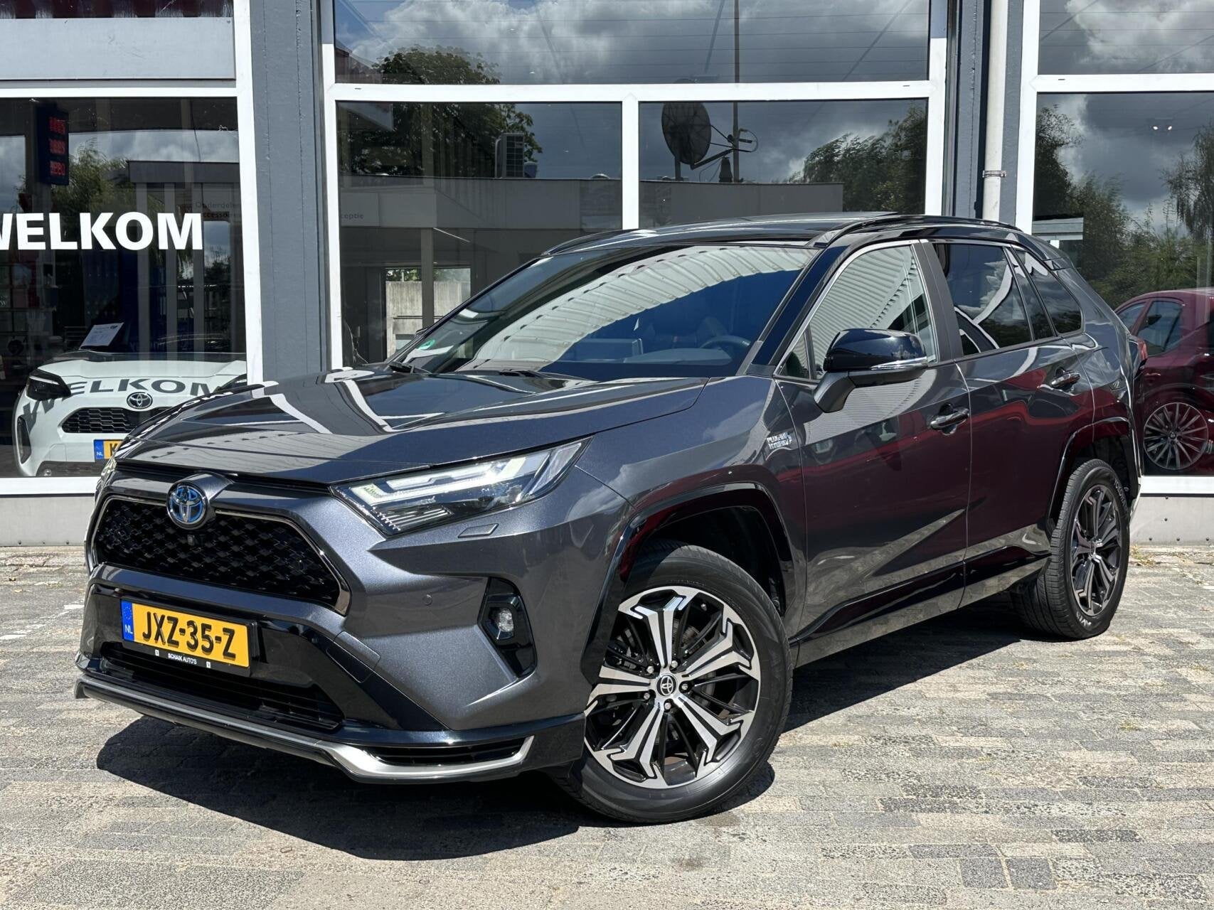 Toyota RAV4 2.5 Plug-in Hybrid AWD Bi-Tone Plus|Rijklaar, Automaat, Dealer onderhouden, Gebruikt, 4 cilinders