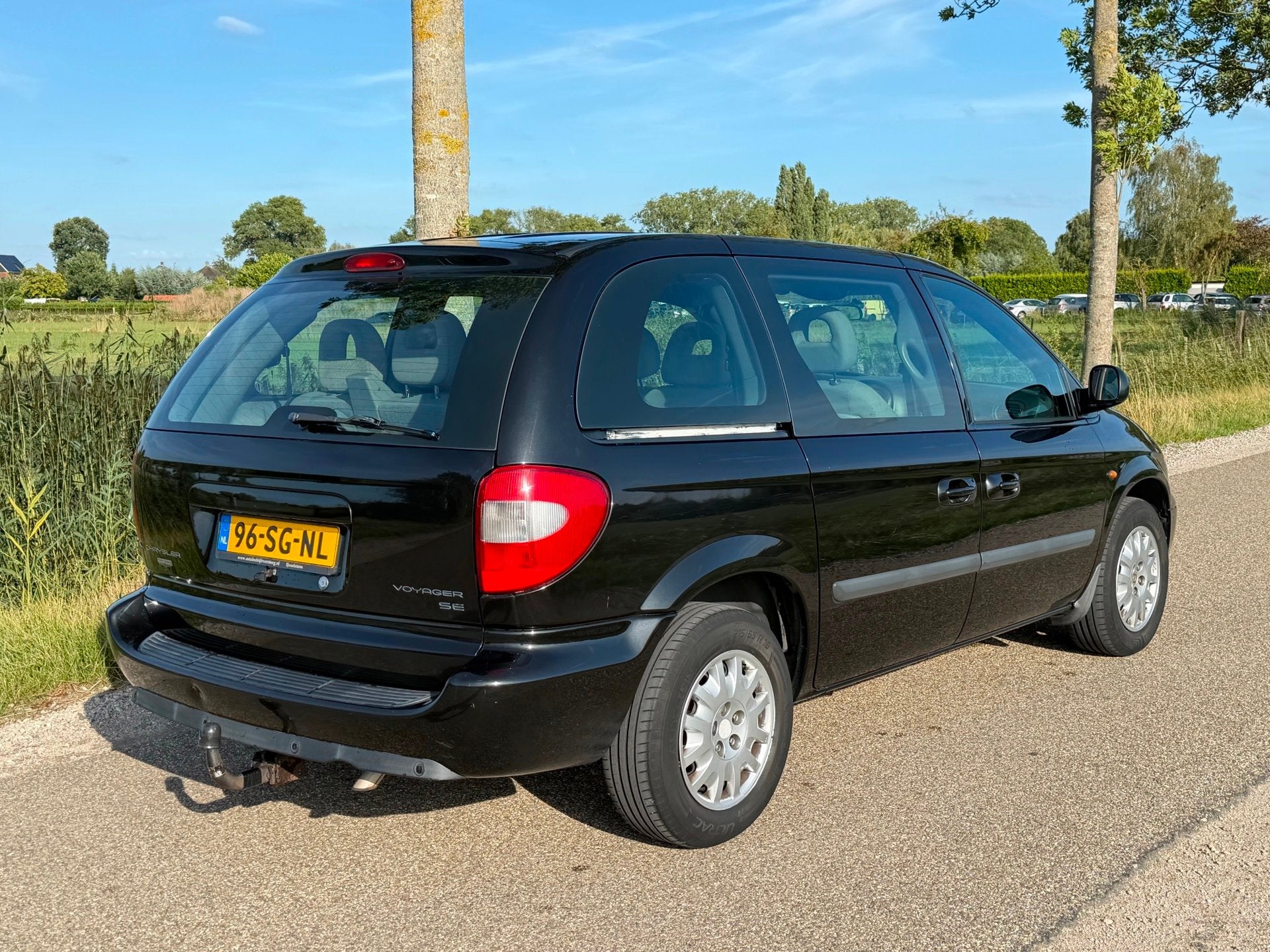Chrysler Voyager 3.3i V6 SE Luxe AUT APK 11-2027 Airco Leder, Auto's, 3301 cc, 450 kg, Gebruikt, Beige