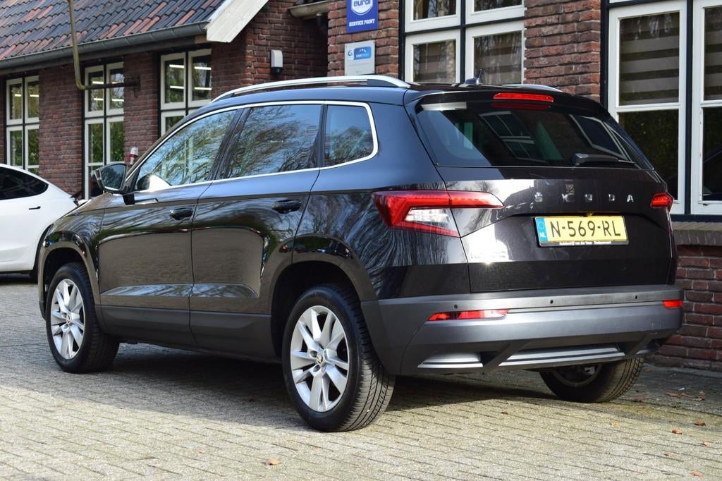 Skoda Karoq 1.0 TSI Business Edition Plus Camera | App conne, Voorwielaandrijving, Lichtsensor, Gebruikt, Met garantie (alle)