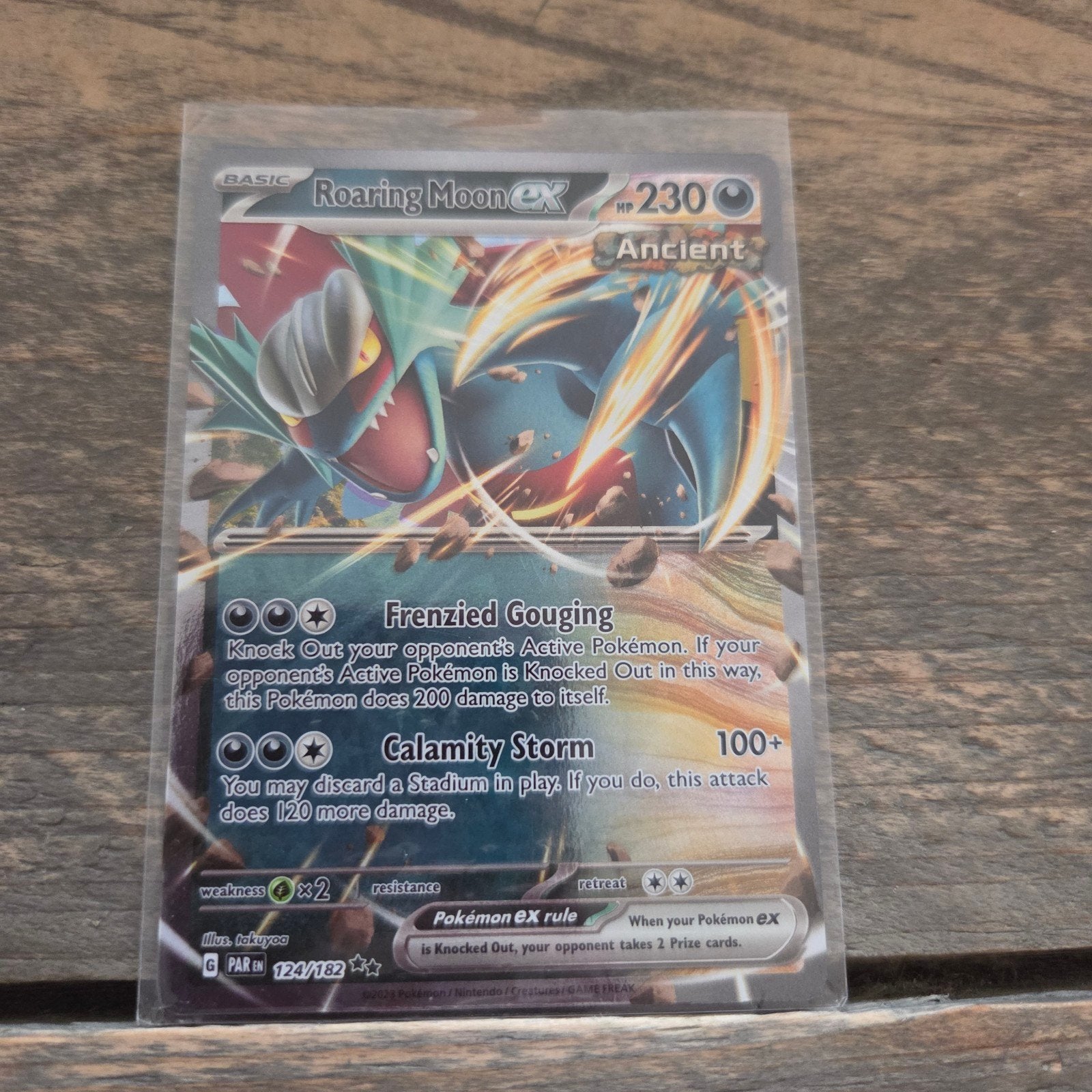 Roaring Moon ex 124/182 - Pokémon Kaart (Ancient), Ophalen of Verzenden, Zo goed als nieuw, Losse kaart