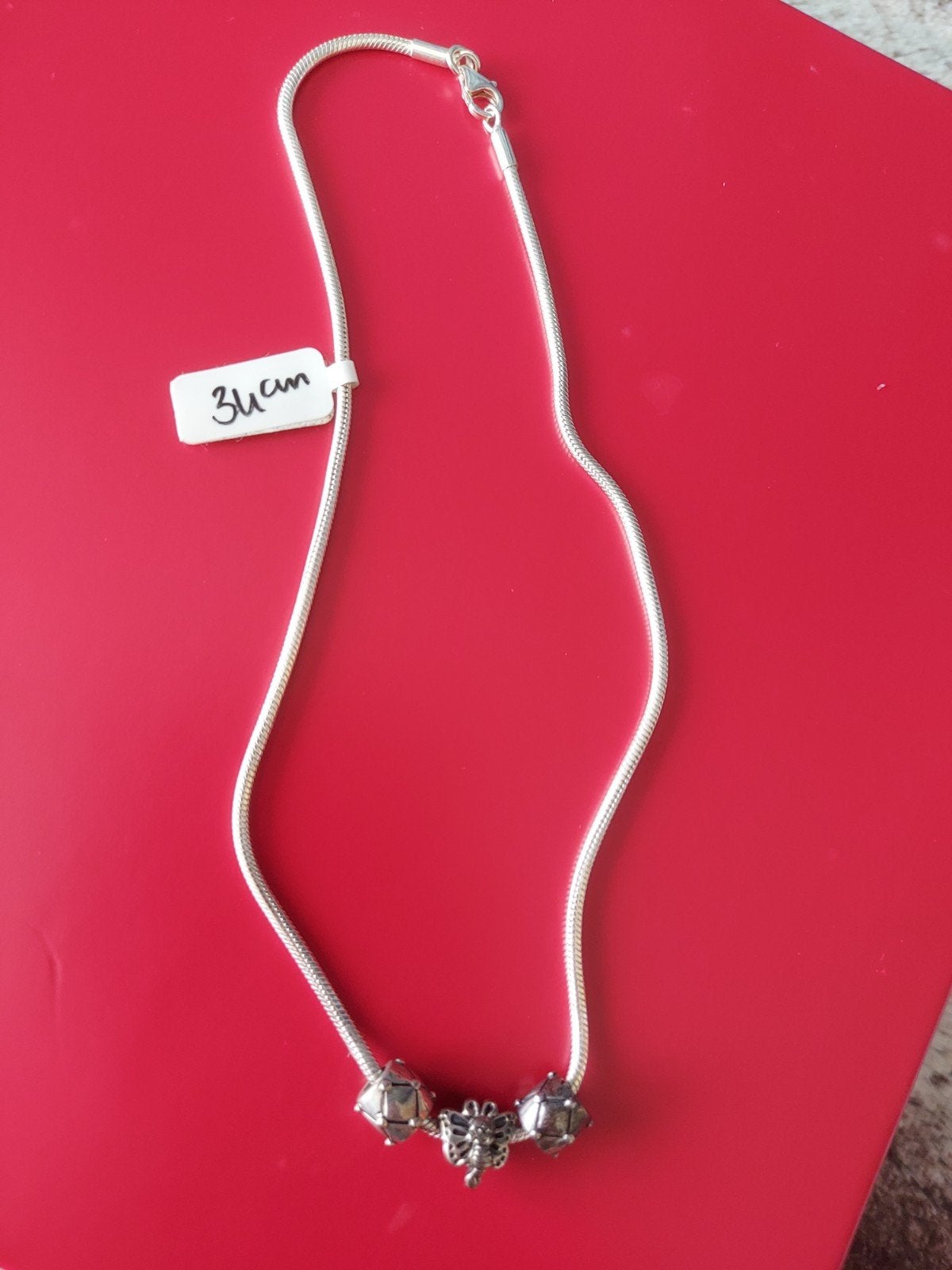 Zilveren 925 ketting 34 cm met 3 bedels, Sieraden, Tassen en Uiterlijk, Met hanger, Gebruikt, Ophalen of Verzenden, Zilver
