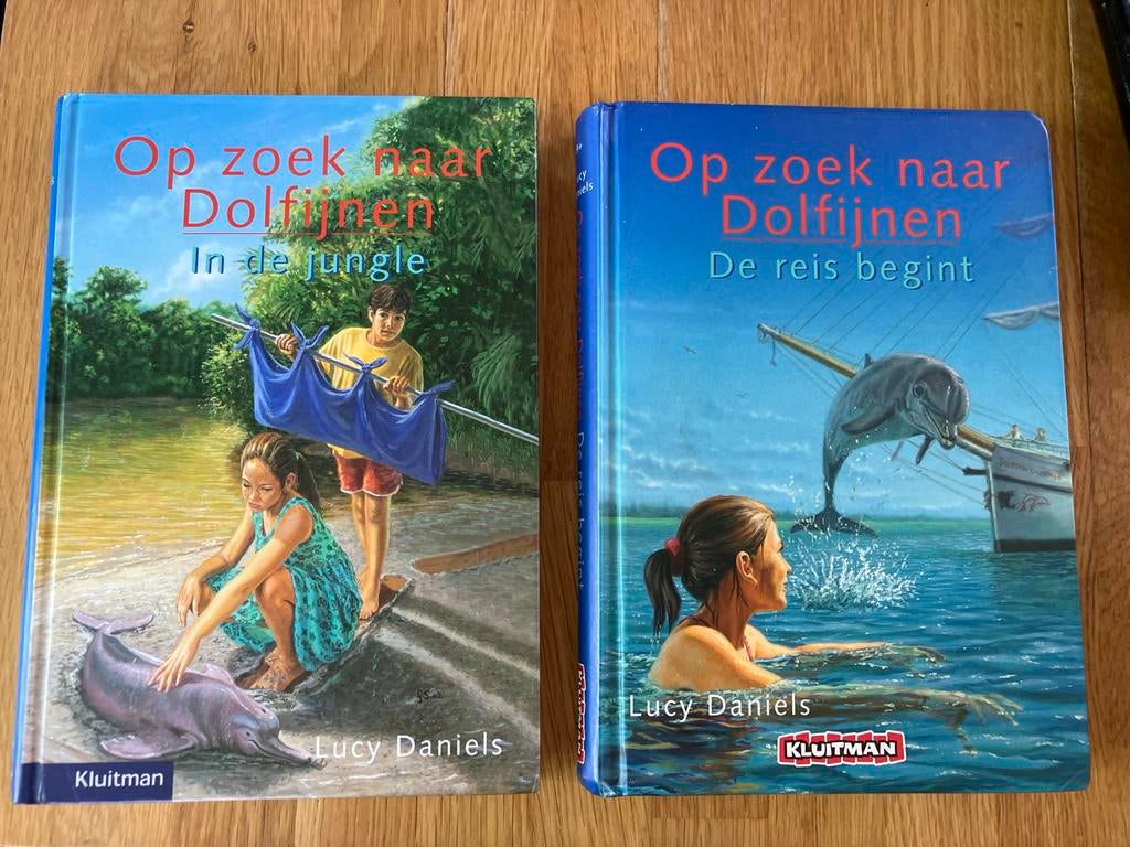 Op zoek naar Dolfijnen - 2 boeken van Lucy Daniels, Boeken, Ophalen of Verzenden, Zo goed als nieuw