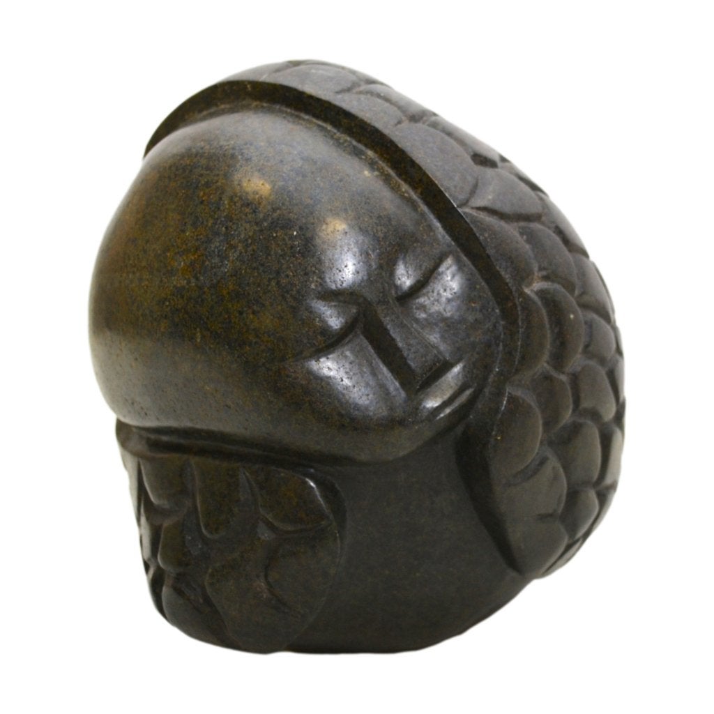 Stenen sculptuur door Charles Atonia (Afrika)