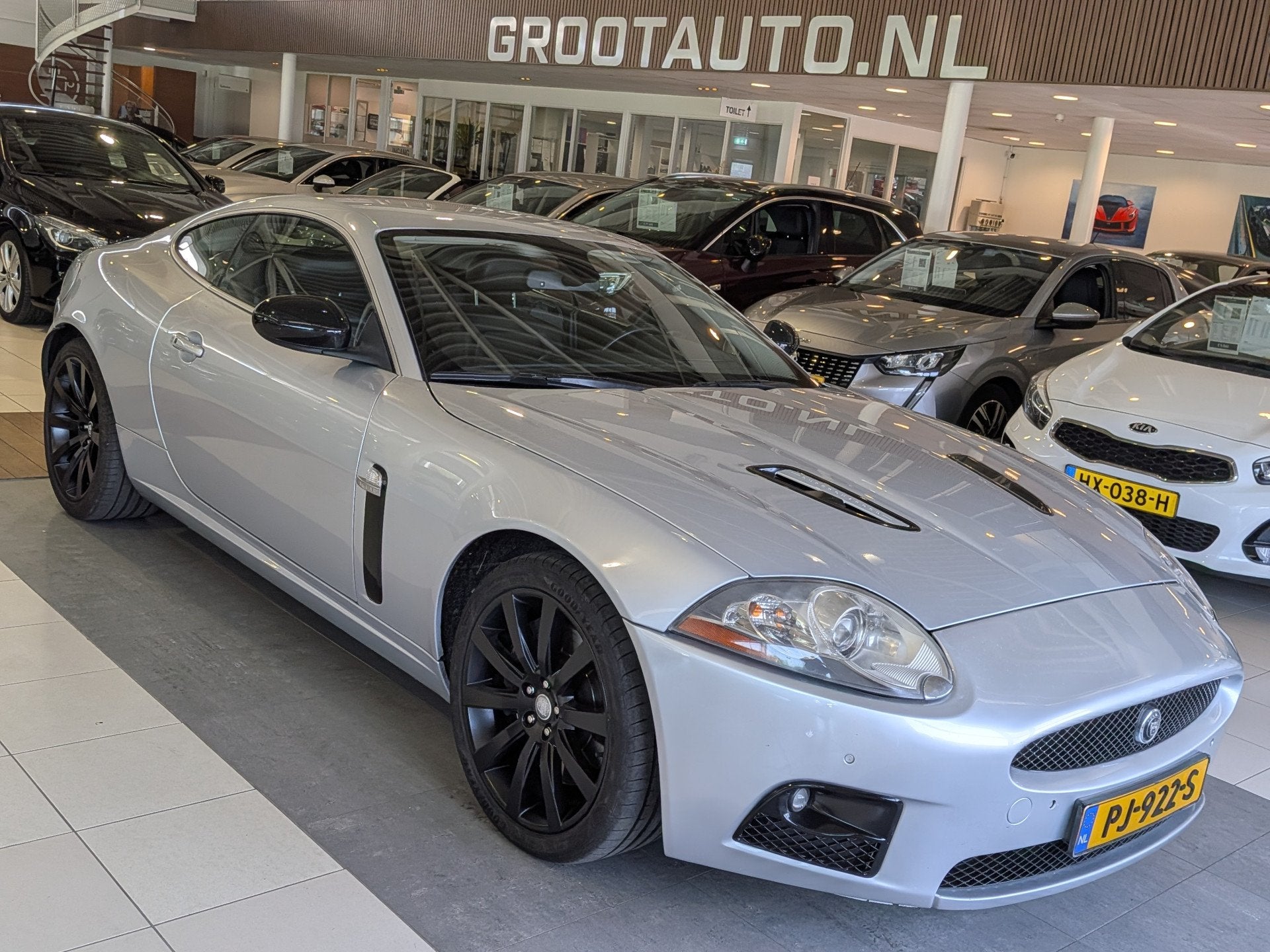 Jaguar XKR 4.2 V8 Coupé Automaat Supercharged 417PK Youngti, Auto's, Jaguar, Achterwielaandrijving, Gebruikt, 4 stoelen, Leder