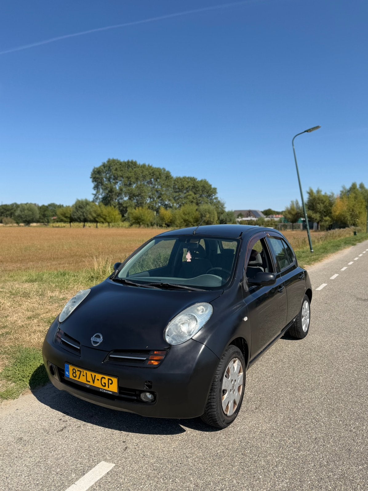 Nissan Micra 1.2 59KW 5DR KOOPJE, Voorwielaandrijving, 40 €/maand, 4 cilinders, Zwart
